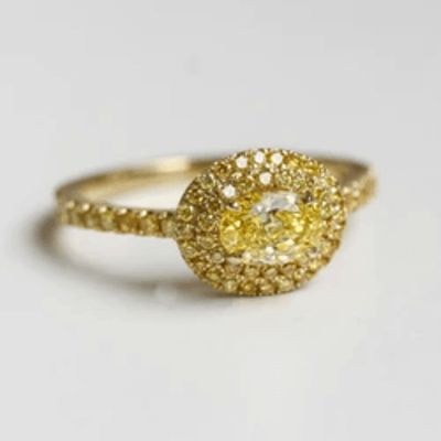 MONOCHROMATIC YELLOW EAST-WEST DIAMOND CLUSTER RING