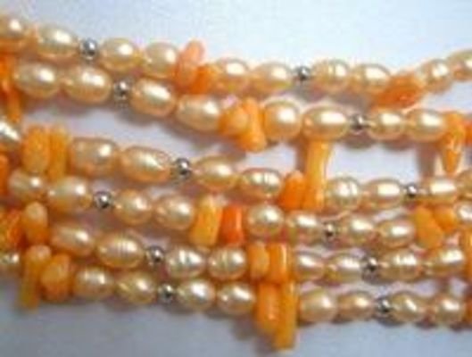 6 strand pink pearl and coral necklace