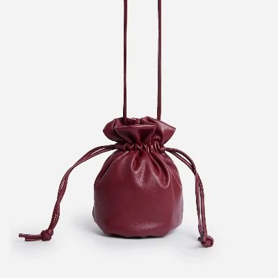 Dodger Drawstring Pouch Cross Body Bag In Red Faux Leather